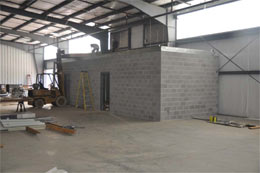 Shipping office and bathrooms. Wood decking being installed for HVAC and Platform.